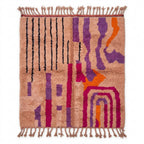 Blush terracotta Boujaad rug with purple, magenta and orange abstract lines, flat lay