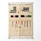 Village Signs Beni Ourain rug full flat lay view
