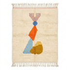 Totem Azilal rug — ivory wool with playful totem motif, flat lay