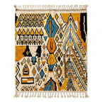 Mustard and teal Boujaad rug — ivory field with dense tribal motifs, flat lay