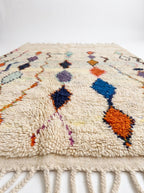 Diamond Cascade Beni Ourain rug side view on white studio background