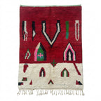 Crimson Boujaad rug — red field with cream base and colorful Berber motifs, flat lay