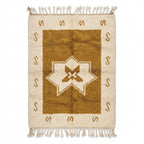 Ochre star Azilal rug — cream border with ochre field and eight-point star, flat lay