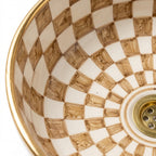 Amber Checkerboard Moroccan ceramic sink - macro of hand-brushed squares and gold rim