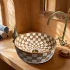 Amber Checkerboard Moroccan ceramic vessel sink styled on a bathroom counter in a Moroccan-inspired setting