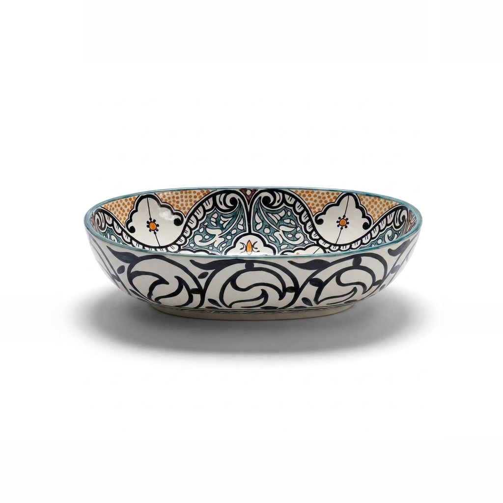 Amber and Teal Heritage Moroccan ceramic vessel sink - black scrollwork exterior with teal and amber interior