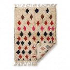 Berry Diamond Azilal rug — folded corner showing plush pile depth