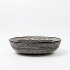 Black and Ivory Fassi Moroccan ceramic sink - side angle of monochrome patterned basin