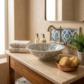 Blue Peony Moroccan ceramic vessel sink styled on a bathroom counter in a Moroccan-inspired setting