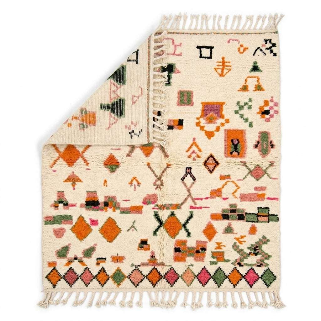 Bordered Blossom Azilal rug — folded corner showing plush pile depth