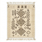 Tribal tales Azilal rug — cream wool with dark brown Berber diamonds and symbols, flat lay