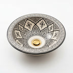 Charcoal Lotus Moroccan ceramic sink - close-up of brass drain detail