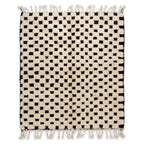Checkerboard Beni Ourain rug, handwoven wool with an ivory and black checkerboard pattern, flat lay top view
