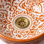 Cinnamon Carved Moroccan ceramic sink - macro of glossy carved texture