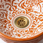 Cinnamon Carved Moroccan ceramic sink - macro of glossy carved texture
