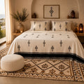 Amazigh Signs bedspread styled on a bed in a Moroccan bedroom