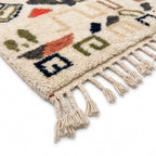 Earthen Field Mrirt rug — hand-knotted fringe detail close-up