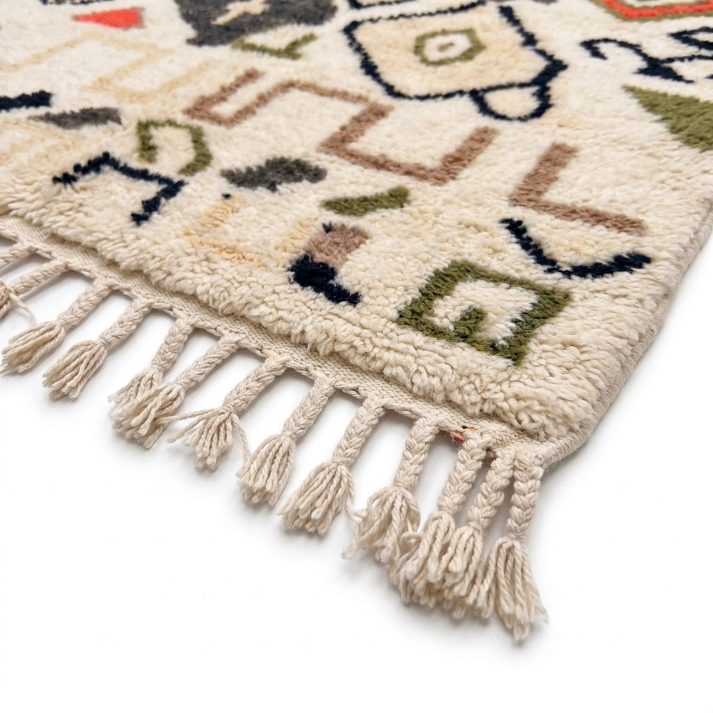 Earthen Field Mrirt rug — hand-knotted fringe detail close-up