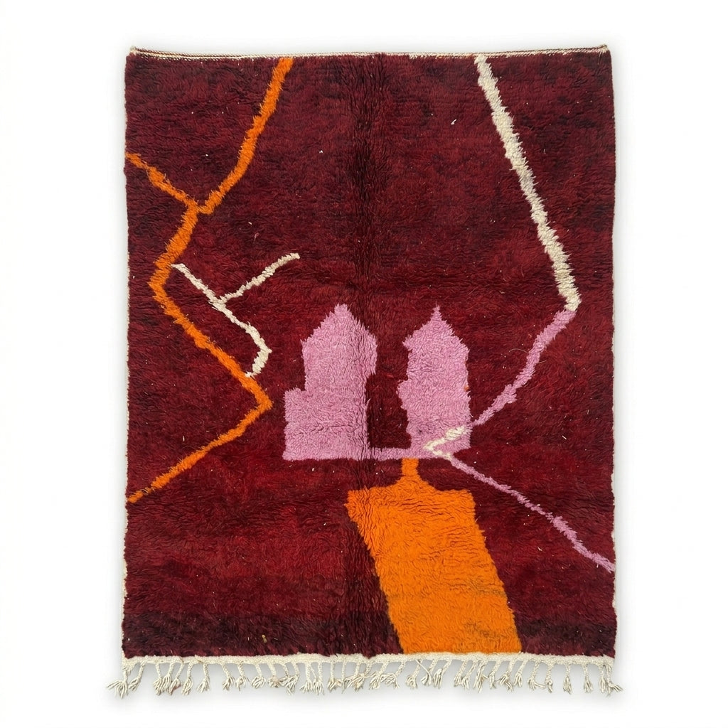 Wine red Boujaad rug with saffron orange path and pink kasbah motifs, flat lay
