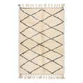 Authentic Beni Ourain rug — cream wool with black diamond pattern, flat lay