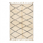 Authentic Beni Ourain rug — cream wool with black diamond pattern, flat lay