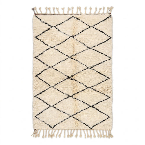 Authentic Beni Ourain rug — cream wool with black diamond pattern, flat lay