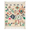 Forest Ember Azilal rug, handwoven wool with green, rust, navy and red tribal symbols, flat lay top view