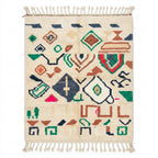 Forest Ember Azilal rug, handwoven wool with green, rust, navy and red tribal symbols, flat lay top view