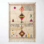 Framed Diamonds Azilal rug, handwoven wool with a grey and black zigzag border with multicolor diamonds, flat lay top view