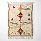 Framed Diamonds Azilal rug, handwoven wool with a grey and black zigzag border with multicolor diamonds, flat lay top view