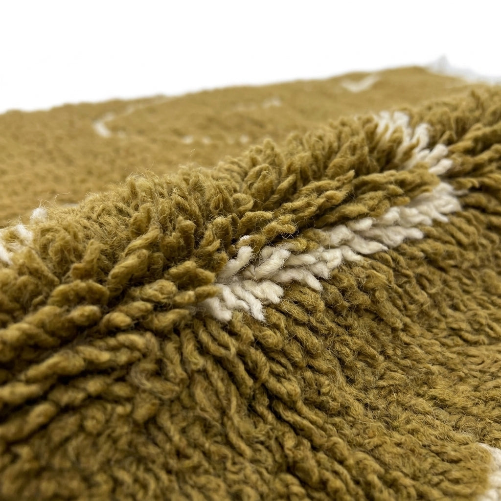 Golden Ochre Mrirt rug — wool pile texture close-up