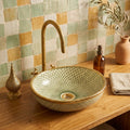 Golden Scale Mandala Moroccan ceramic vessel sink styled on a bathroom counter in a Moroccan-inspired setting