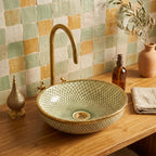 Golden Scale Mandala Moroccan ceramic vessel sink styled on a bathroom counter in a Moroccan-inspired setting