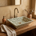 Green Vine Rectangular Moroccan ceramic vessel sink styled on a bathroom counter in a Moroccan-inspired setting