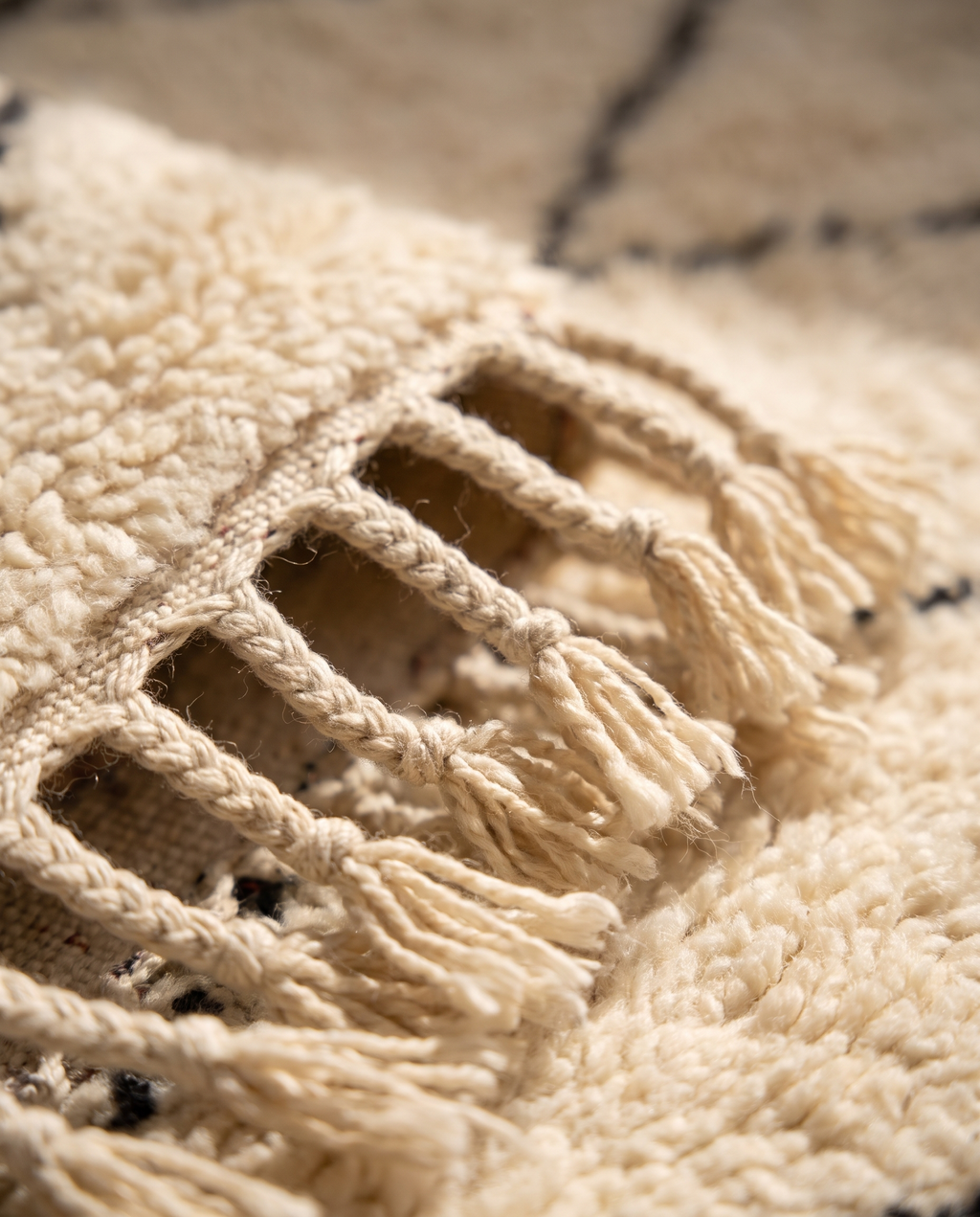 Hand-braided wool fringe tassels detail — authentic Beni Ourain Moroccan rug