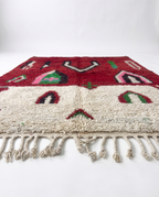 Crimson Boujaad rug side view showing pile height on white studio background