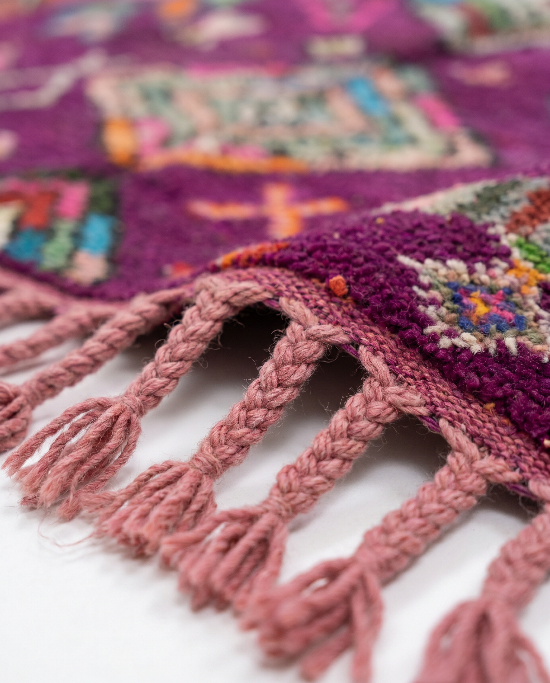 Purple Boujaad rug dusty pink fringe detail on white studio background