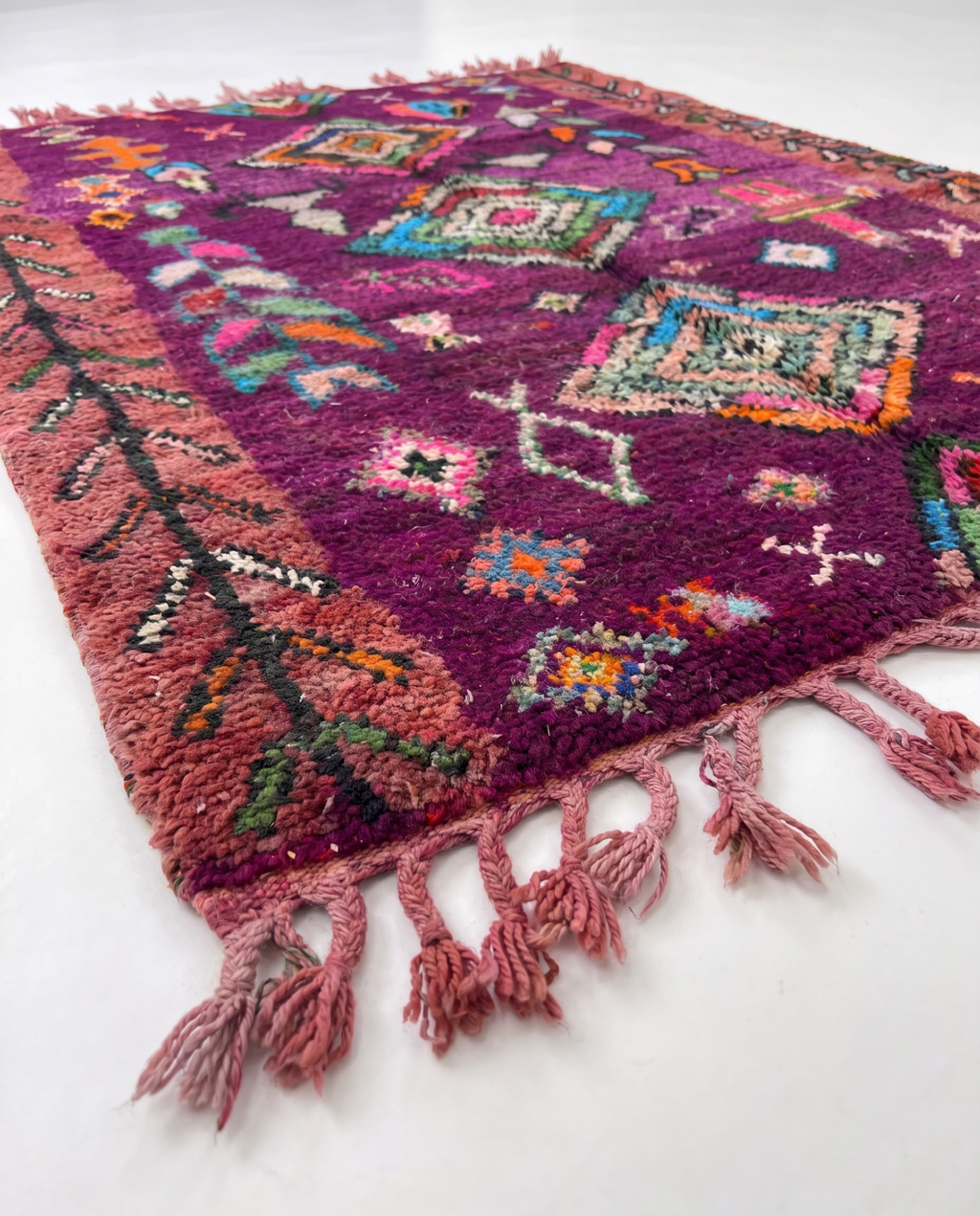 Purple Boujaad rug side view on white studio background