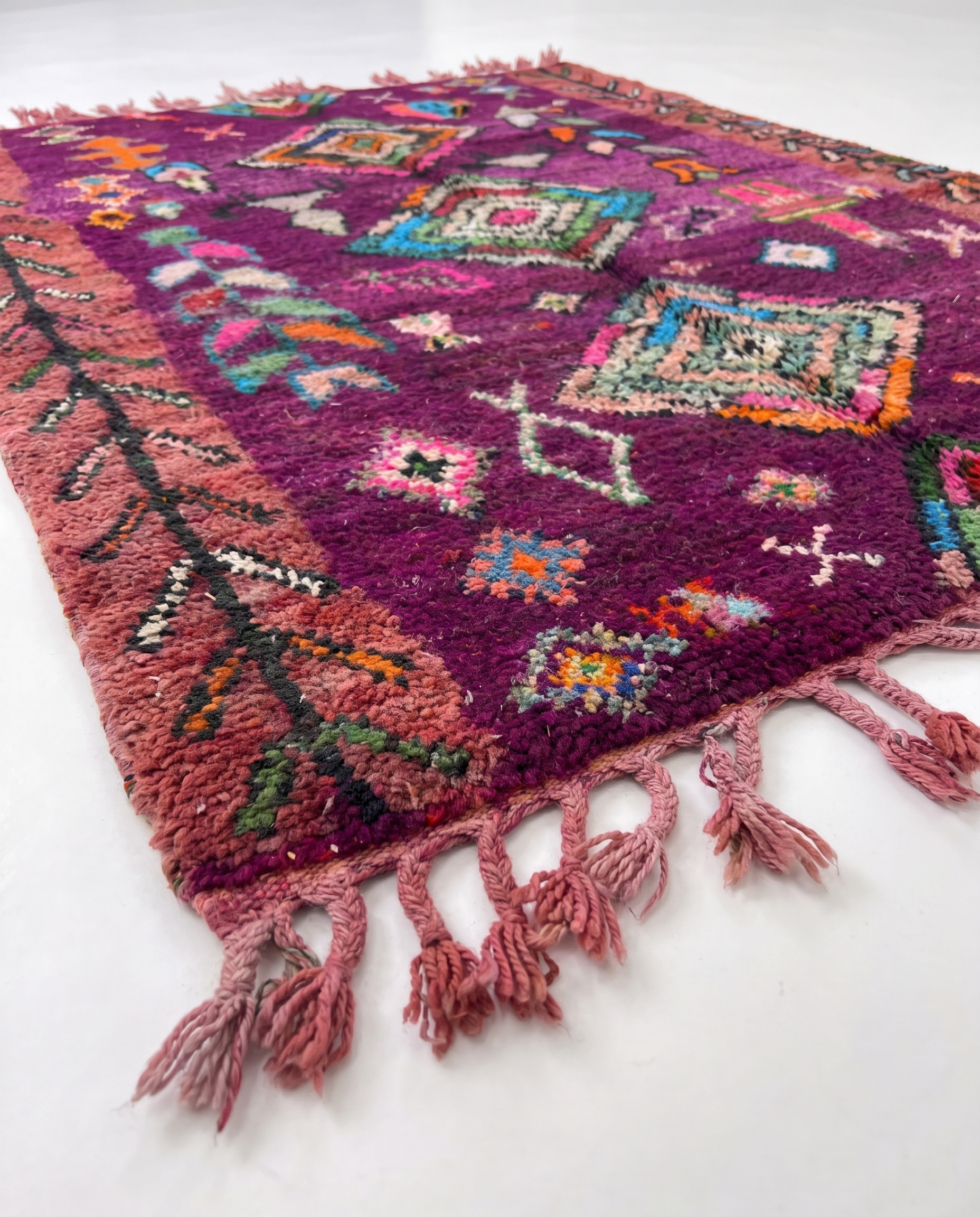 Purple Boujaad rug side view on white studio background