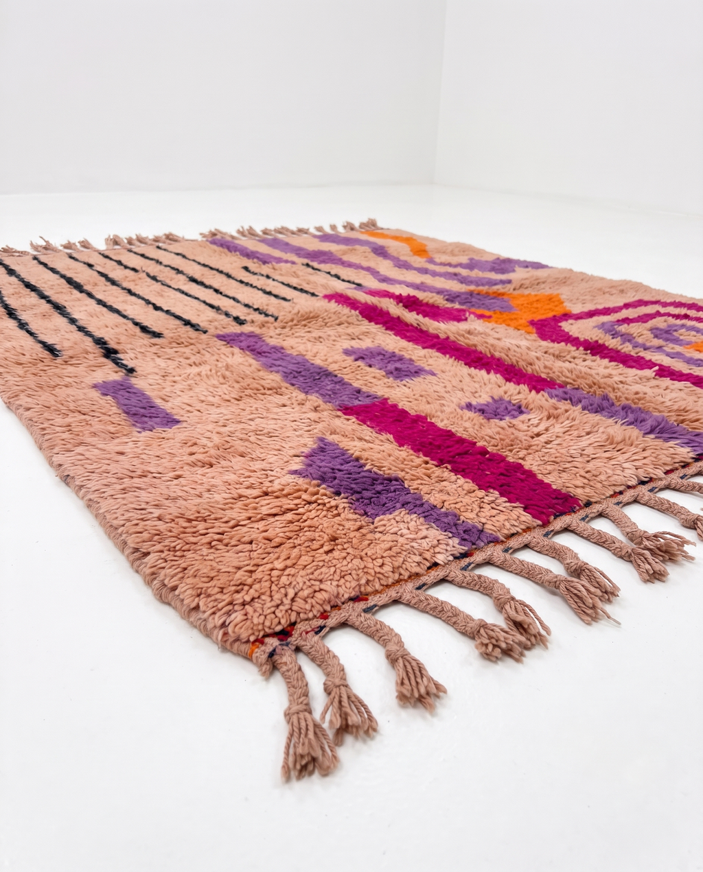 Blush terracotta Boujaad rug side view on white studio background