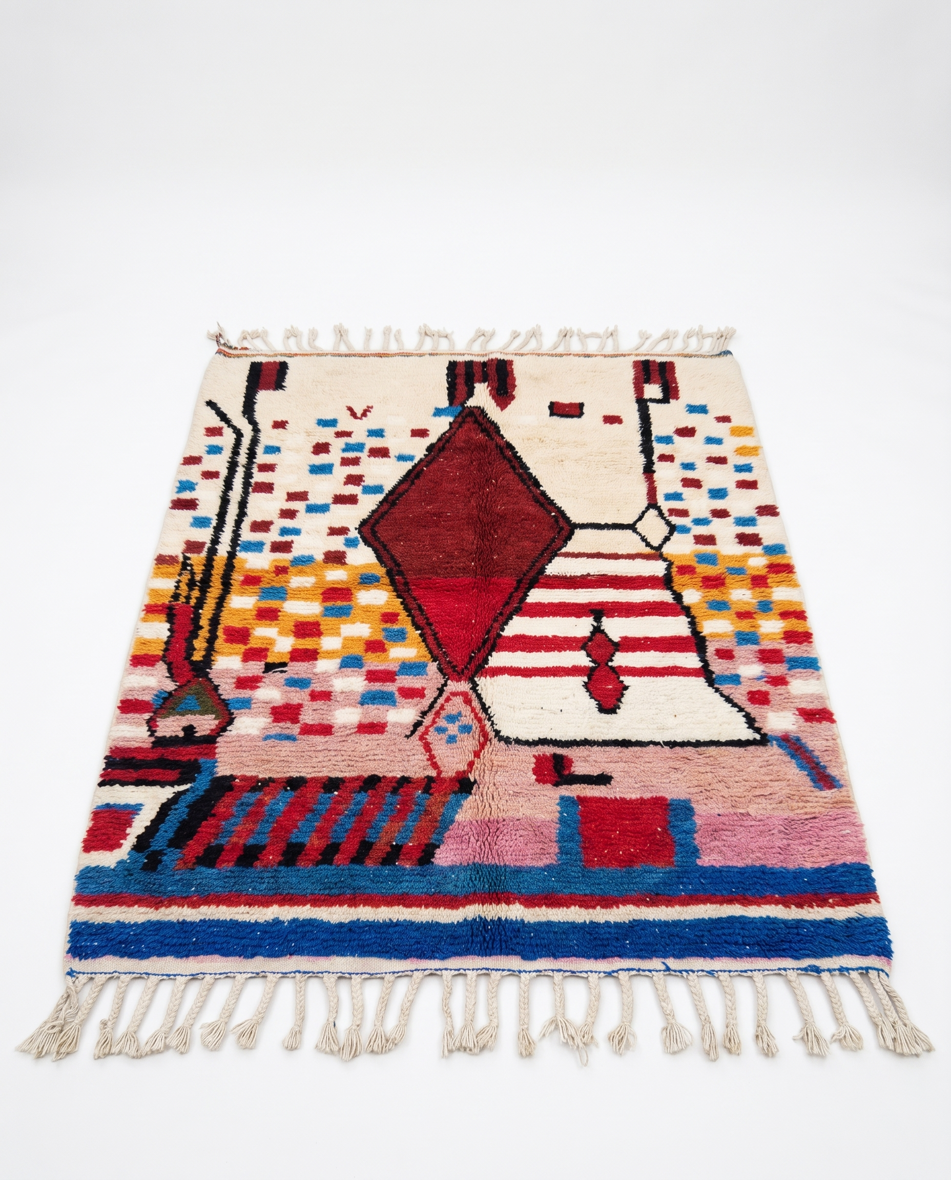 Garnet diamond Boujaad rug full view at an angle on white studio background