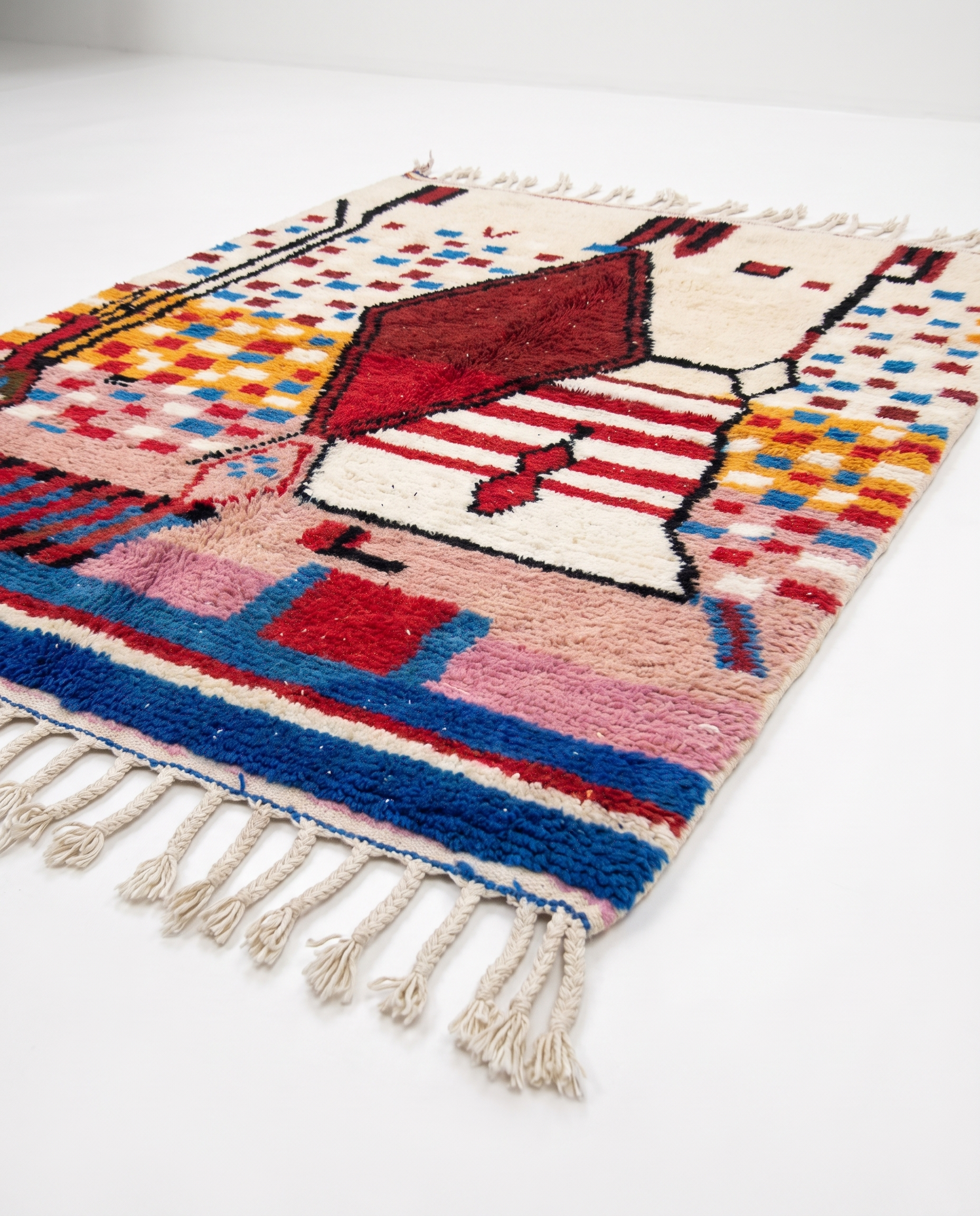Garnet diamond Boujaad rug side view on white studio background