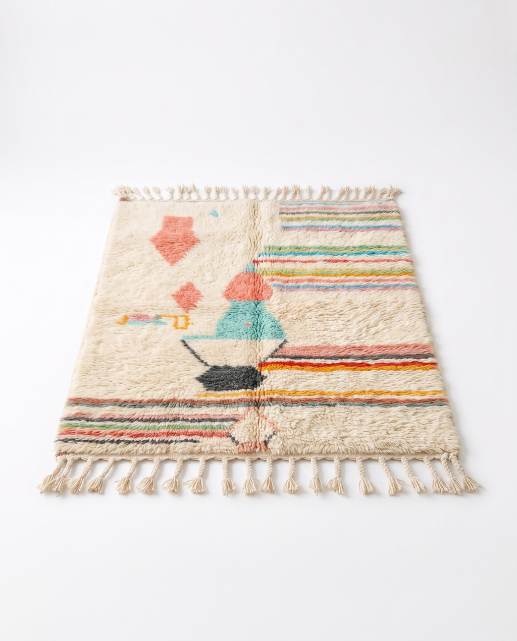 Pastel rainbow Azilal rug full view at an angle on white studio background