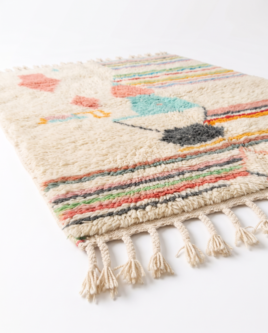 Pastel rainbow Azilal rug side view on white studio background