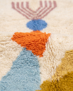 Totem Azilal rug wool texture close-up on white studio background