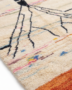 Atlas roots Azilal rug wool texture close-up on white studio background