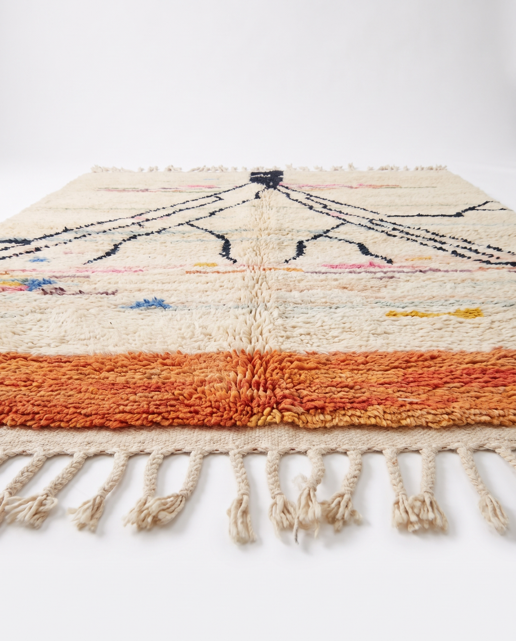 Atlas roots Azilal rug side view on white studio background