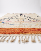 Atlas roots Azilal rug side view on white studio background