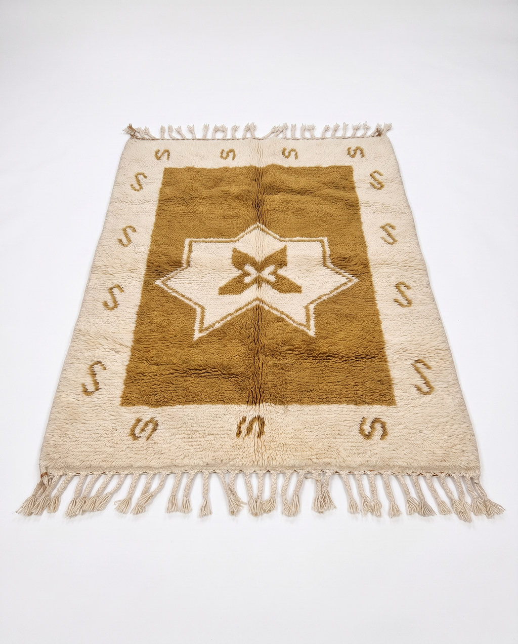 Ochre star Azilal rug full view at an angle on white studio background