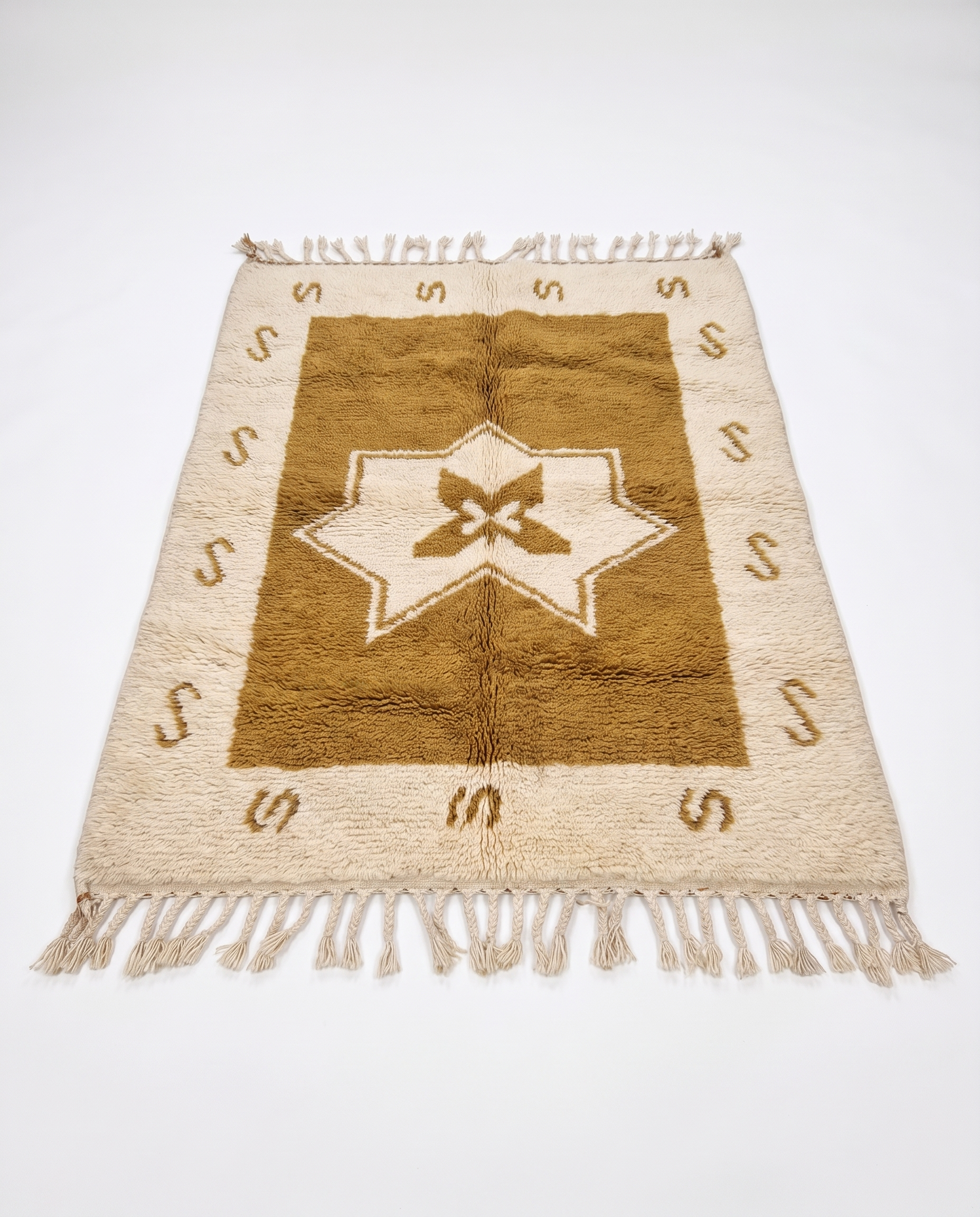Ochre star Azilal rug full view at an angle on white studio background